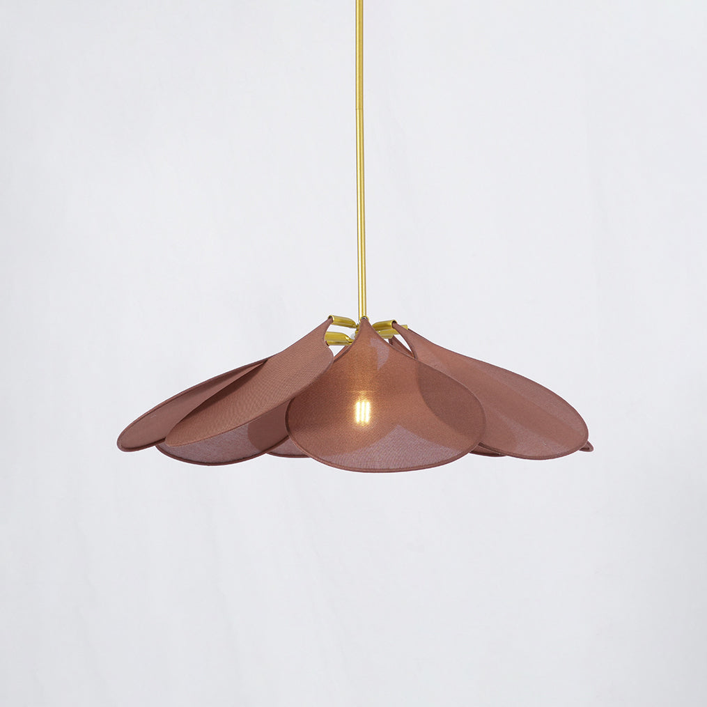 Studio shot of this Clérachic pendant lamp, its wine-red petals fanned around a glowing bulb on a brass stem.