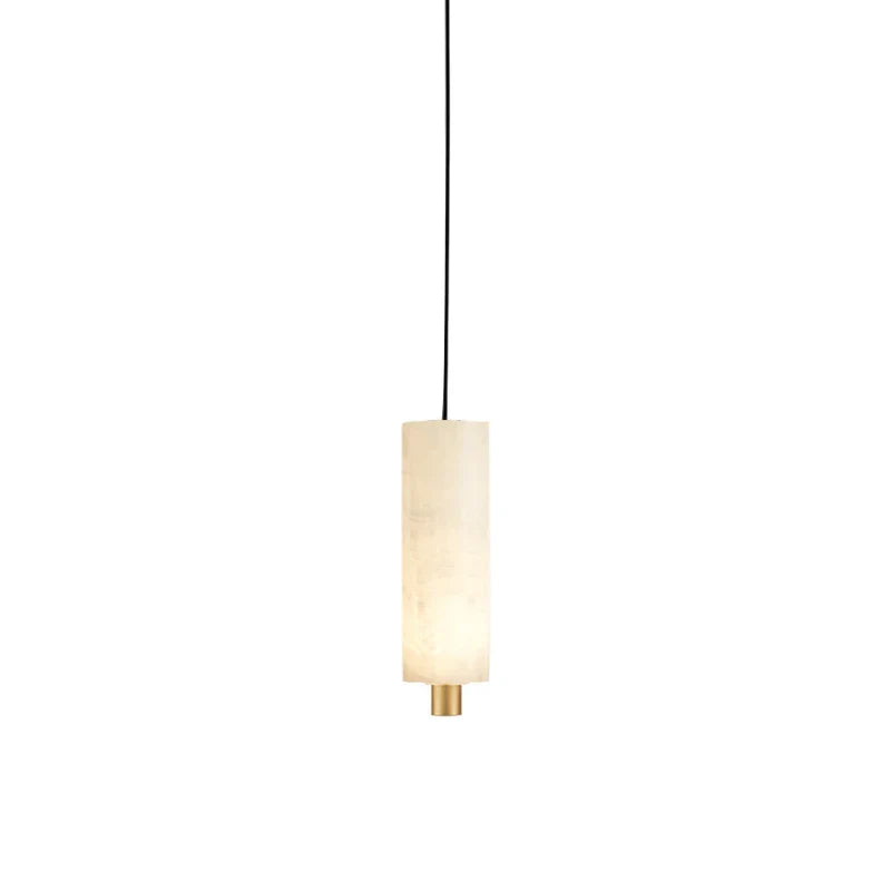 Single-head Zovarion alabaster pendant light with a brass base cap hanging from a slim black cord.