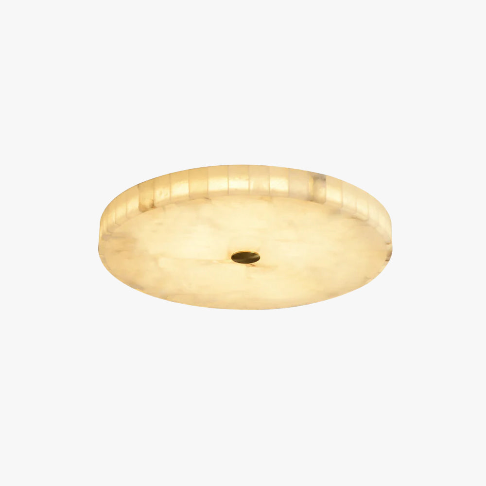 Unlit Kristy ceiling lamp on a plain white background, angled to show its shallow round profile