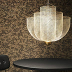Layered steel wire pendant light viewed from a low angle
