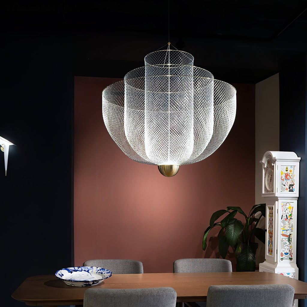 Spherical wire pendant light glowing against a dark backdrop
