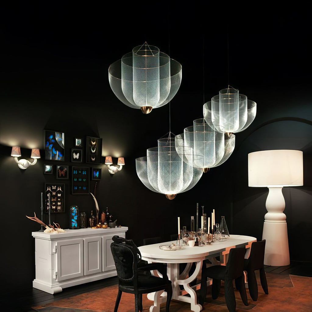 Spherical steel wire pendant light against a plain wall