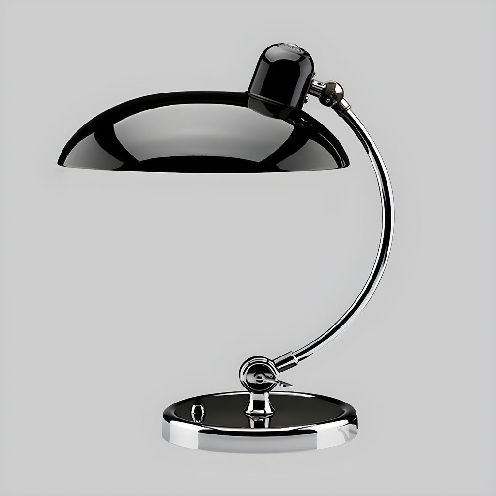 Photographed on a plain grey backdrop, this black Clérachic desk lamp stands at full length.