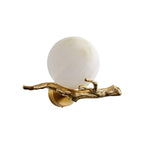 A tighter studio crop of the lit Clérachic wall light, centred with the round wall canopy clearly visible.