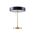 Revolve table lamp with spun metal shade on a gold iron base