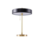 Revolve table lamp with spun metal shade on a gold iron base