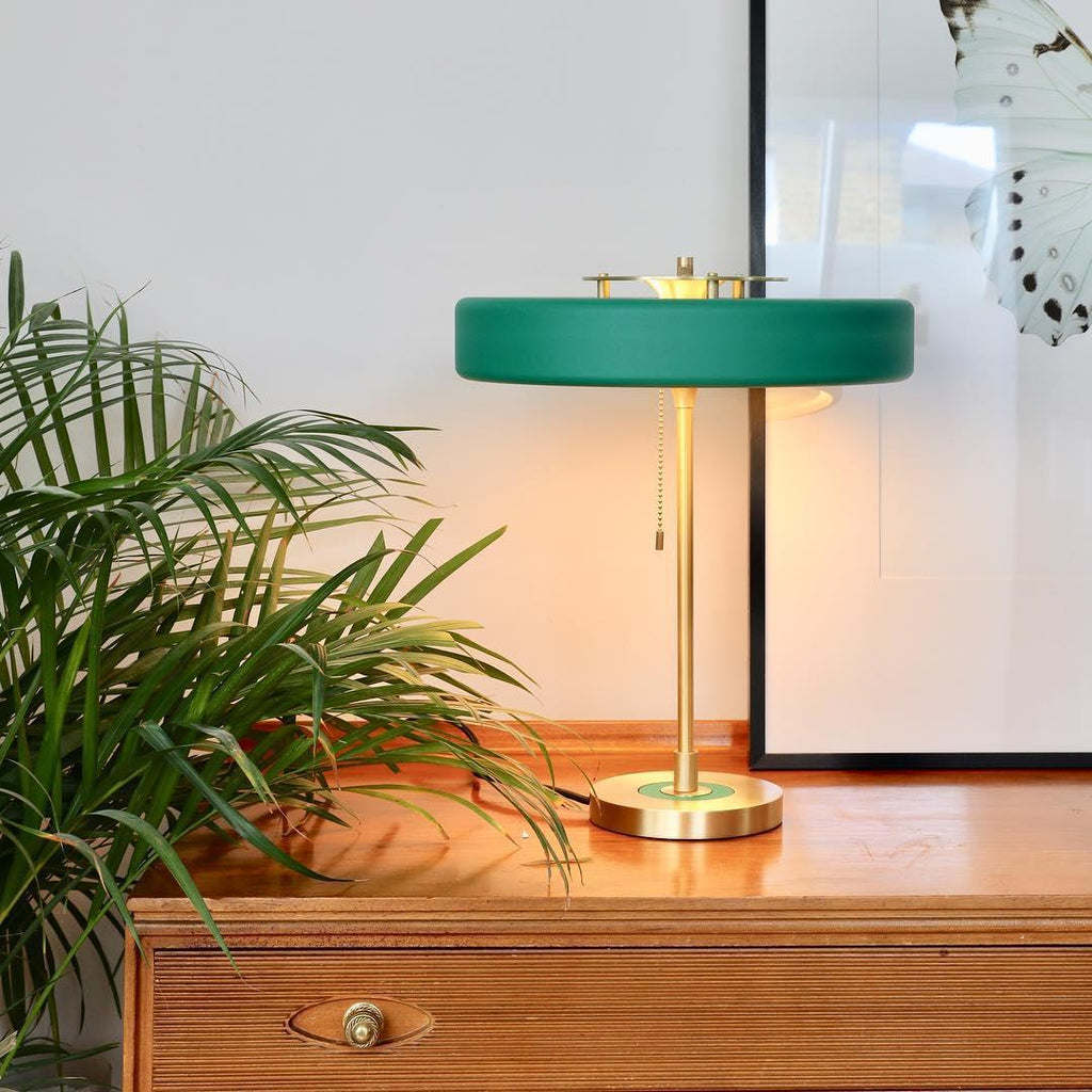 Spun metal table lamp with coloured shade ring detail