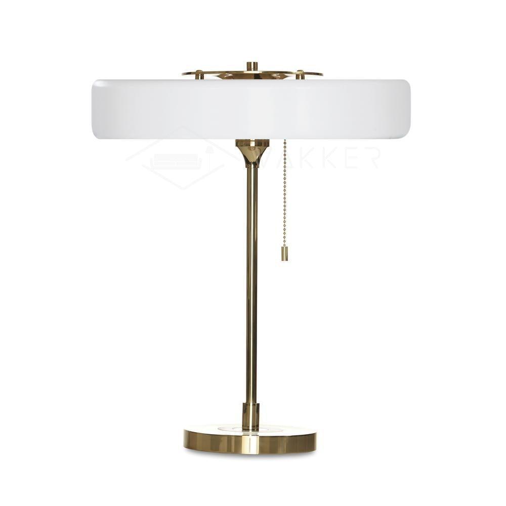Spun metal lamp shade with soft glow at top and bottom