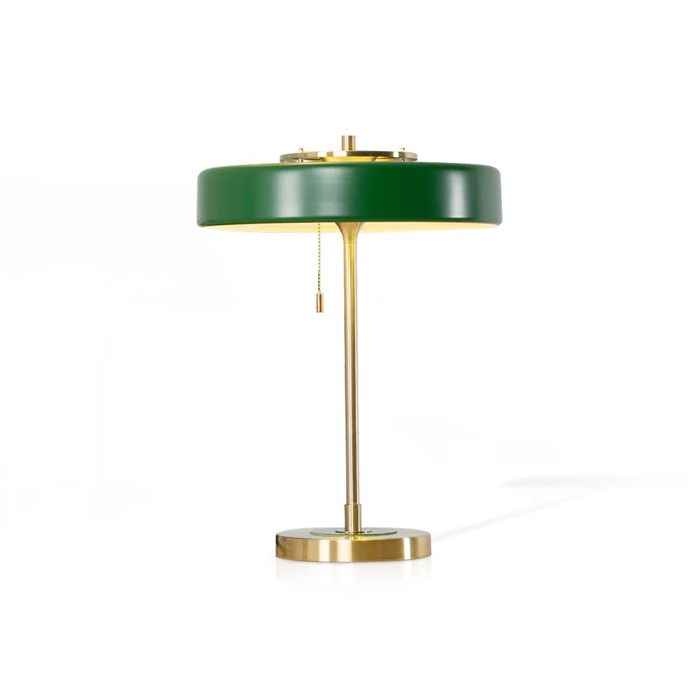 Revolve table lamp standing on a bedside table