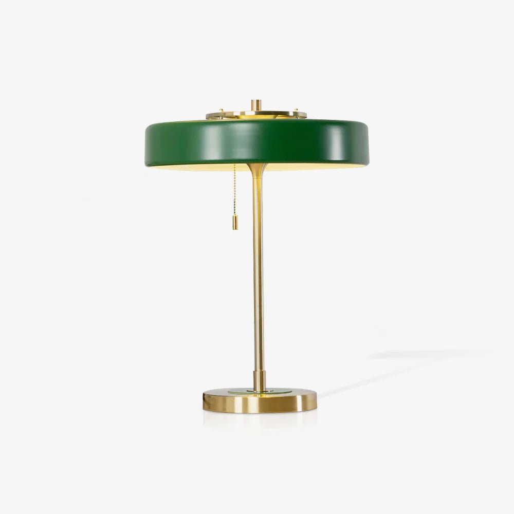 Table lamp with opal diffuser glowing on a desk