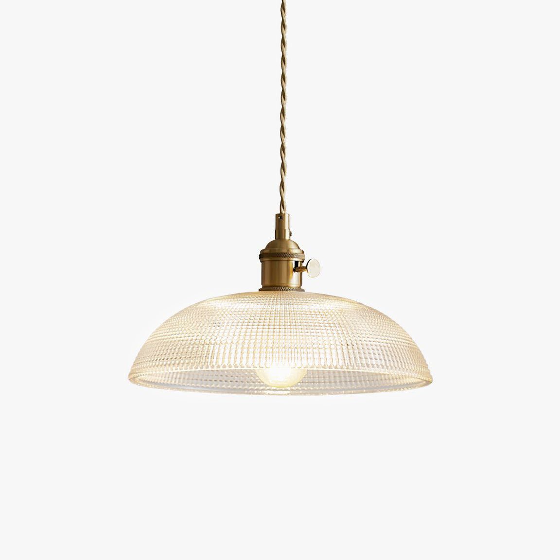 Unlit 25 cm ribbed glass shade of this Clérachic pendant, on a polished brass fitting against a plain white background.