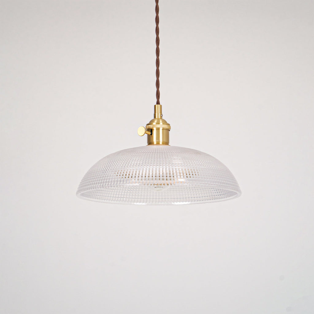 This Clérachic pendant's shade shown unlit on a plain white background, a dark twisted cord above.
