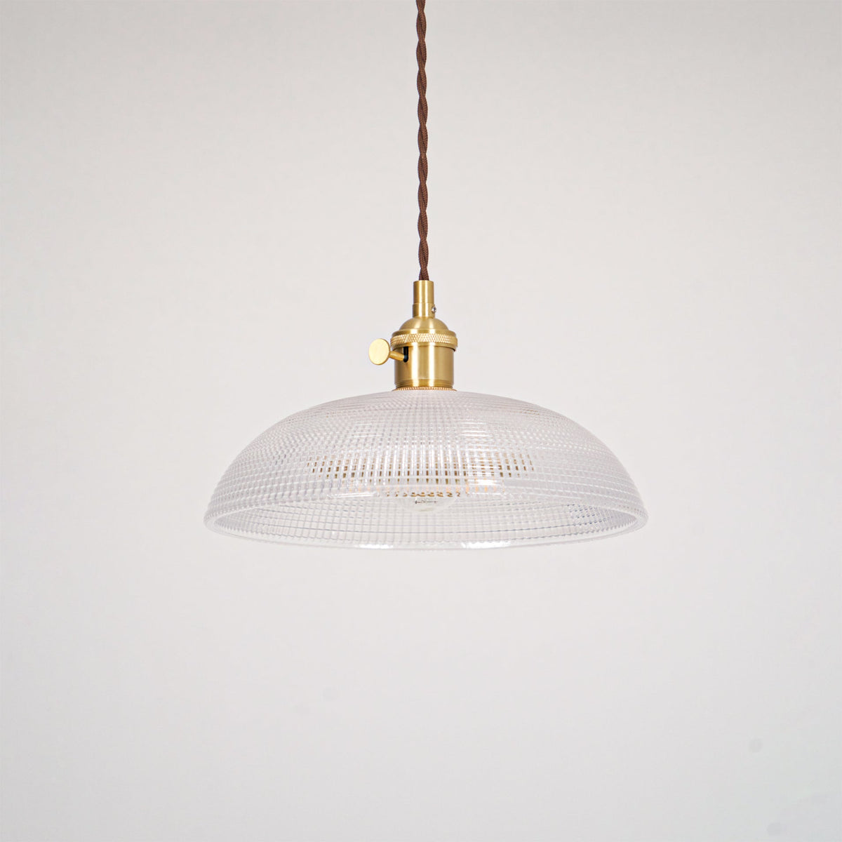 This Clérachic pendant's shade shown unlit on a plain white background, a dark twisted cord above.