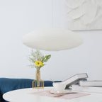 Handcrafted washi paper pendant shade lit warmly