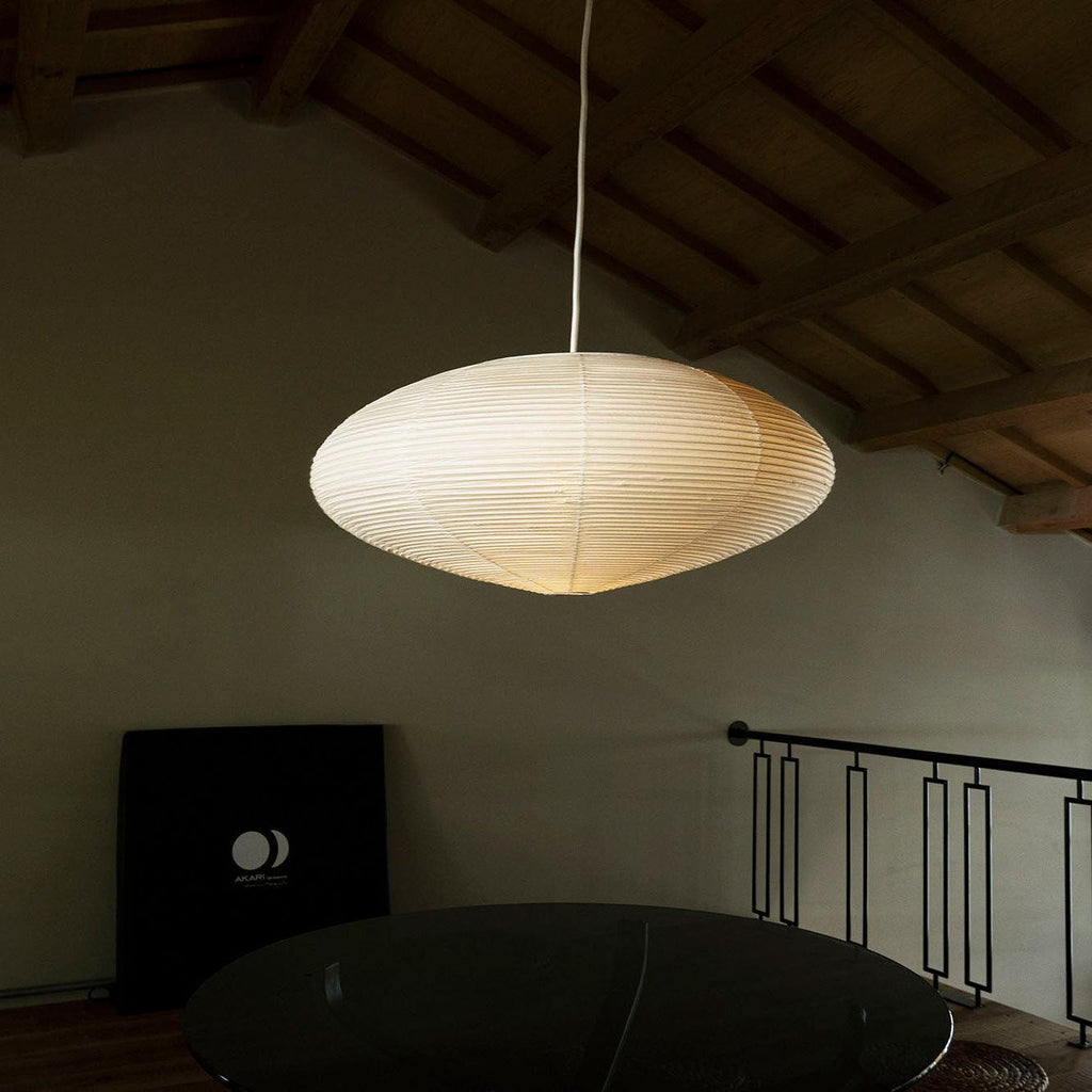 White swag pendant light styled in a living space