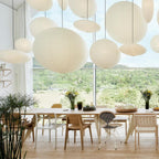 Cluster of mulberry paper pendants at varied heights