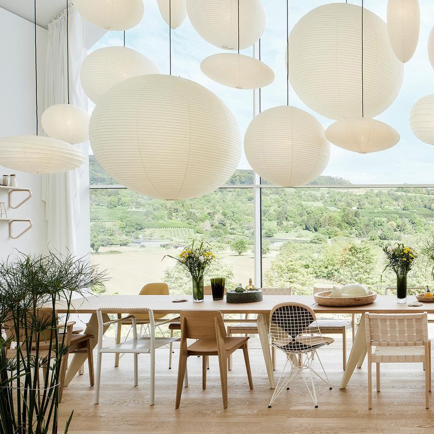 Cluster of mulberry paper pendants at varied heights