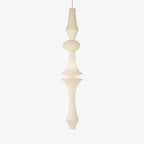 White paper pendant drop hung over a stairwell