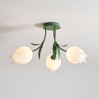 On a plain grey background, one shade of this Clérachic ceiling light in green shows a ruffled, irregular edge.