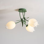 On a plain grey background, this Clérachic ceiling light in green shows its three shades overlapping slightly in view.