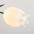 Close view of the ruffled, hand-cut edge on one acrylic shade of this Clérachic ceiling light.