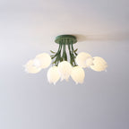 On a plain lavender-grey background, this Clérachic ceiling light in green shows its full cluster of shades unlit.