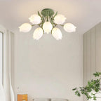 In the corner of a plain bedroom, this Clérachic ceiling light in green reaches its lily-shaped shades toward a sheer curtain.