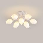 Shown from another angle on a beige background, this Clérachic ceiling light in green fans its shades wide.