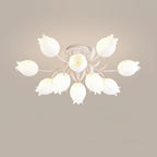 Seen from above on a beige background, this Clérachic ceiling light in green shows its shades in full symmetry.