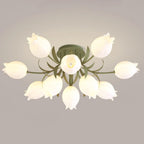 Lit on a grey background, this Clérachic ceiling light in green glows from its central bloom outward.