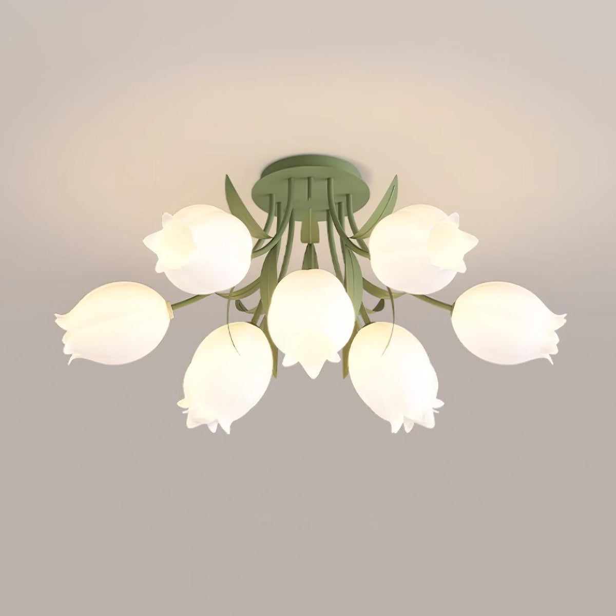On a plain grey background, this Clérachic ceiling light in green shows a tighter, single-tier ring of shades.
