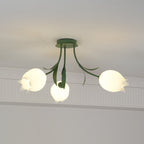 Near a cove moulding, this three-shade Clérachic ceiling light in green is seen from a slightly different angle.