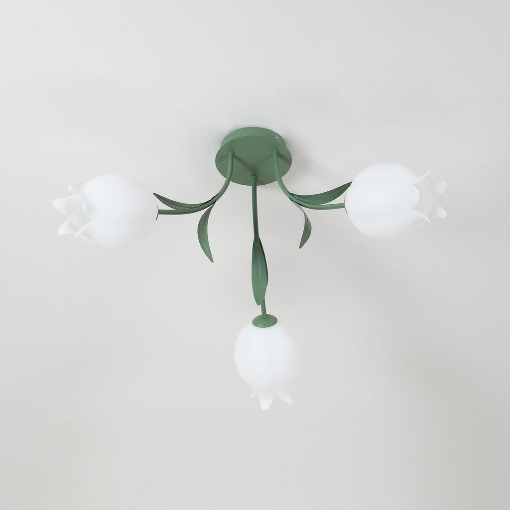 Seen from the side near a cove moulding, this Clérachic ceiling light in green shows two shades clearly.