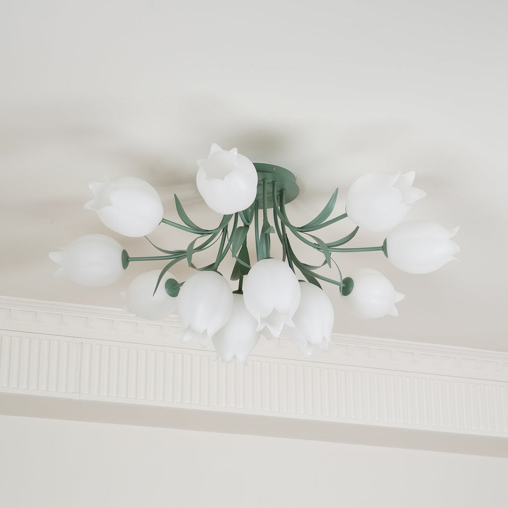 Near a cove moulding, this Clérachic ceiling light in green hangs with its full cluster of shades unlit in daylight.