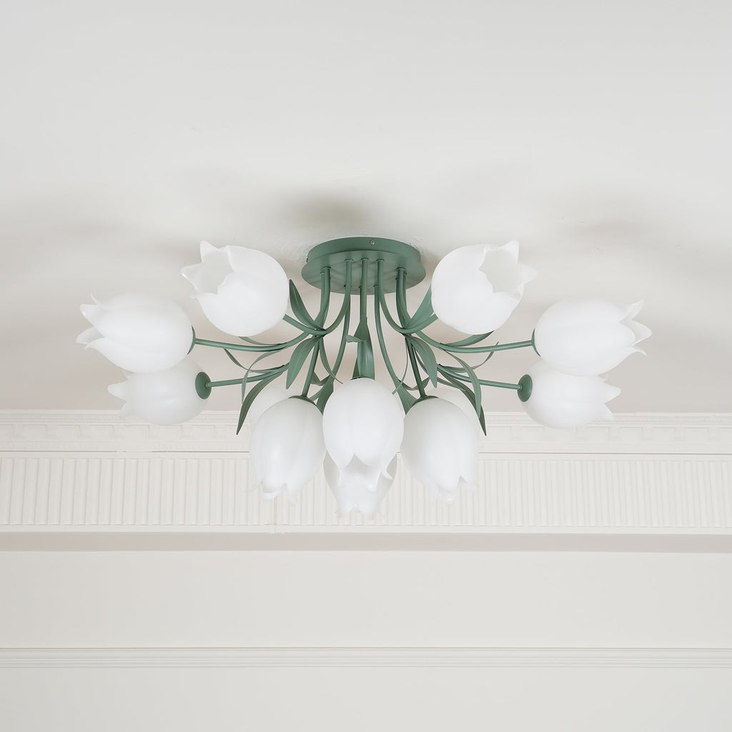 Shown close beneath a cove moulding, this Clérachic ceiling light in green has its cluster of shades unlit.