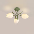 A closer view of this Clérachic ceiling light in green on a plain grey background, its stems and leaves visible at the top.