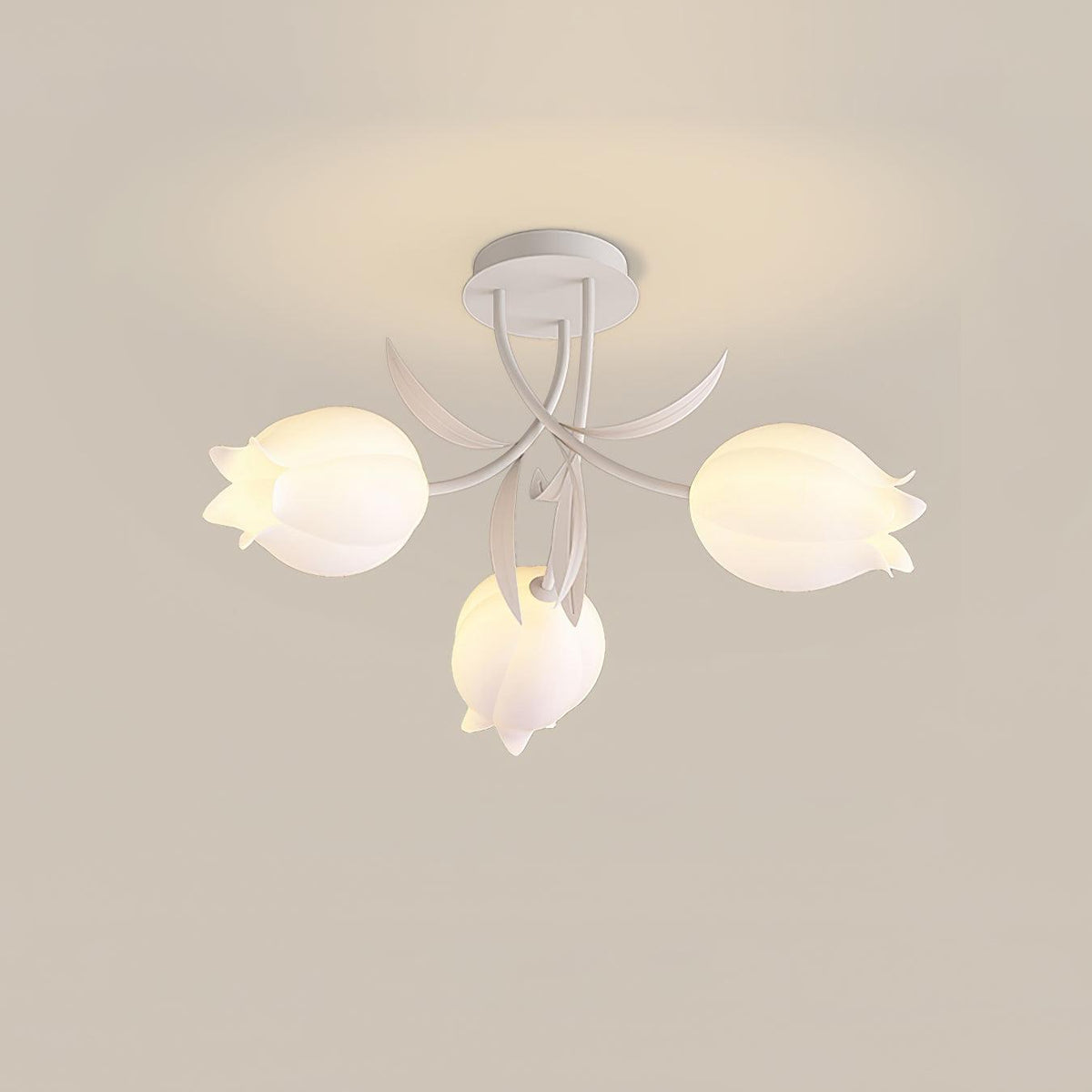 On a plain grey background, three lily-shaped shades on this Clérachic ceiling light in green form a tripod arrangement.