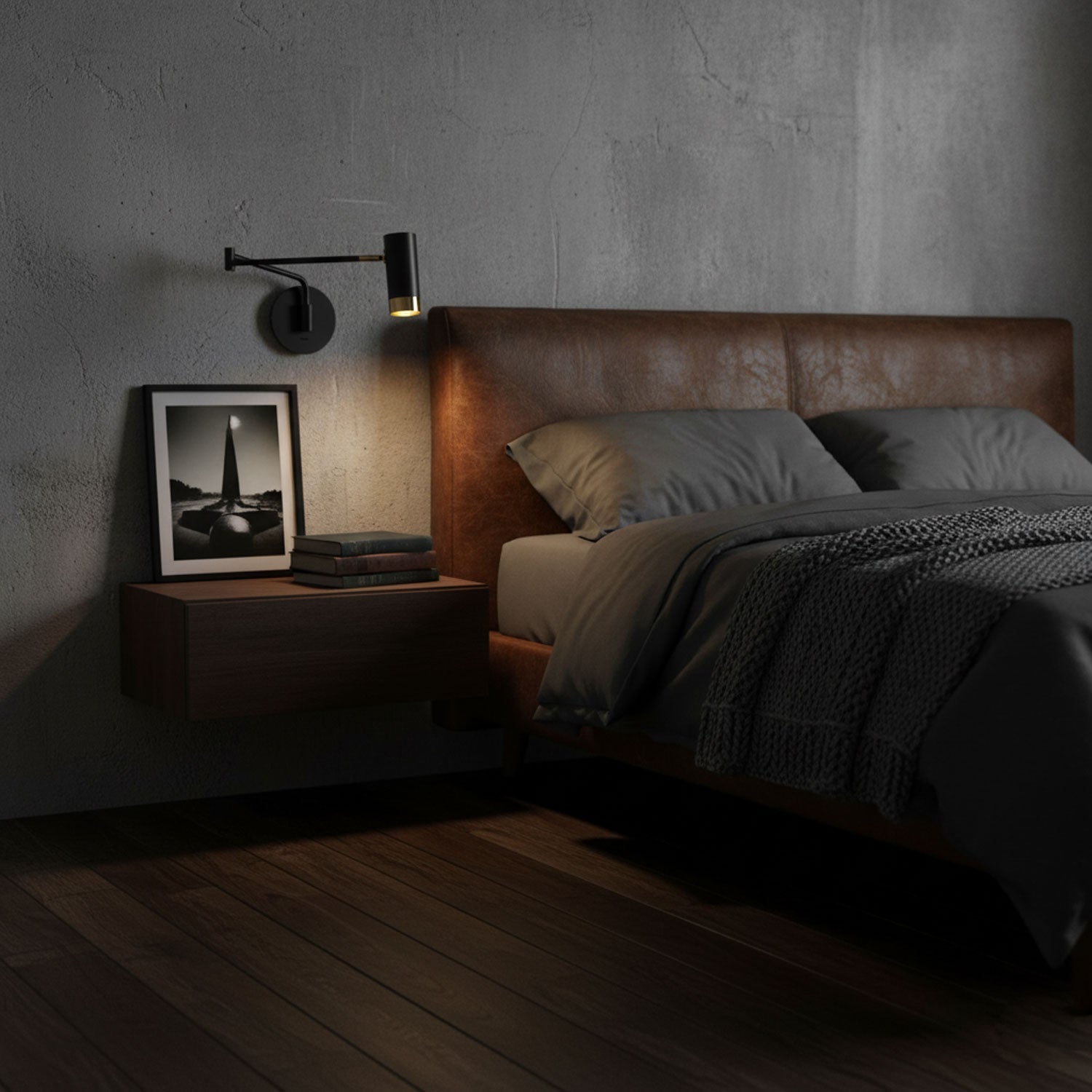 White and gold swing arm wall lamp mounted above a desk