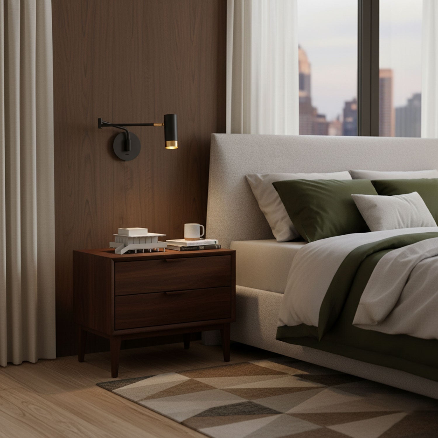 Black and gold swing arm wall lamp lit in a hallway