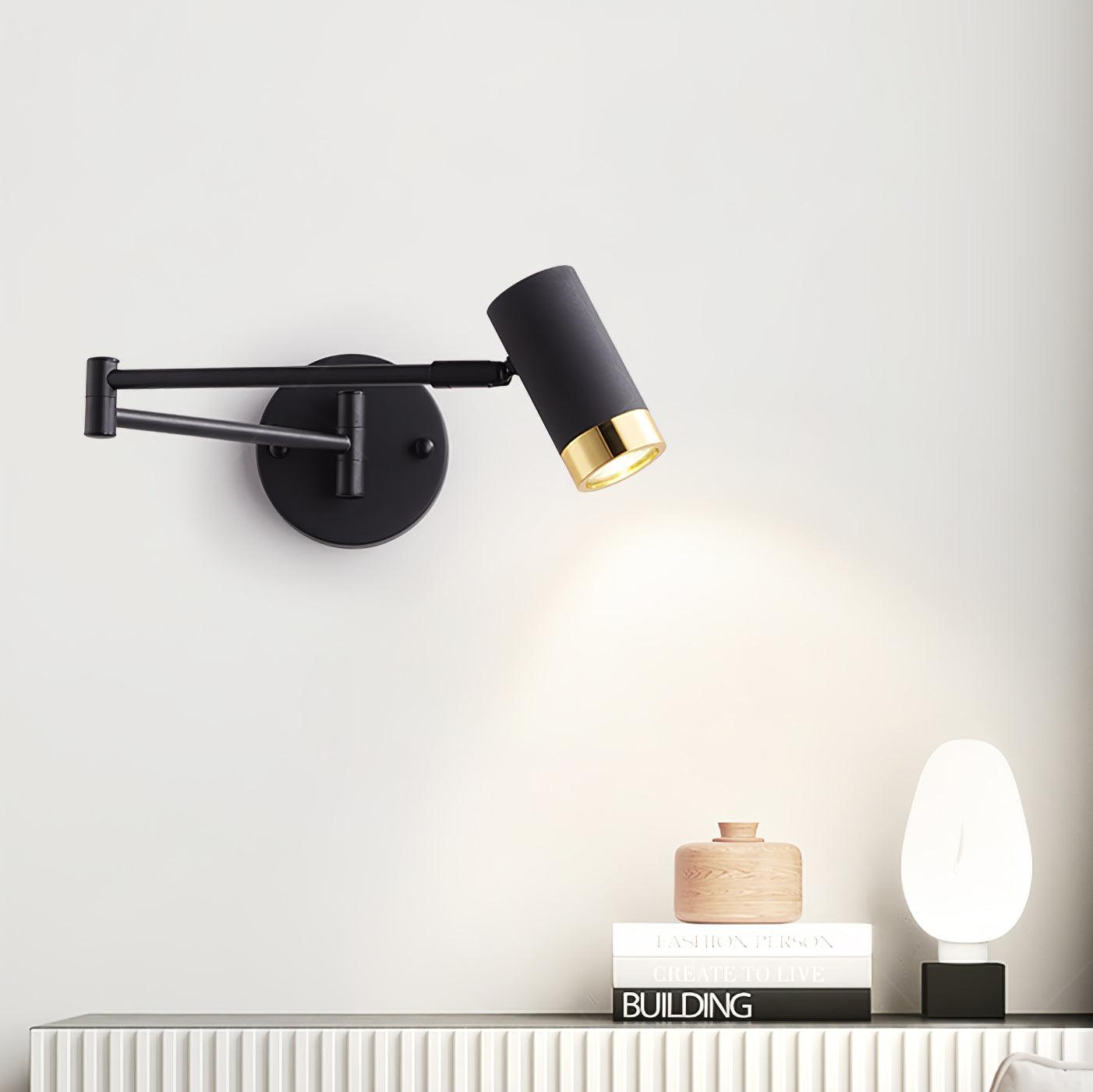 Swing arm wall lamp shown in full with elongated shade