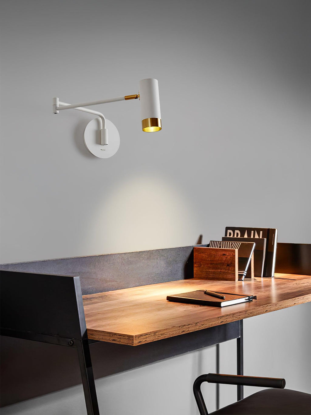 Swing arm wall lamp shade detail with gold interior