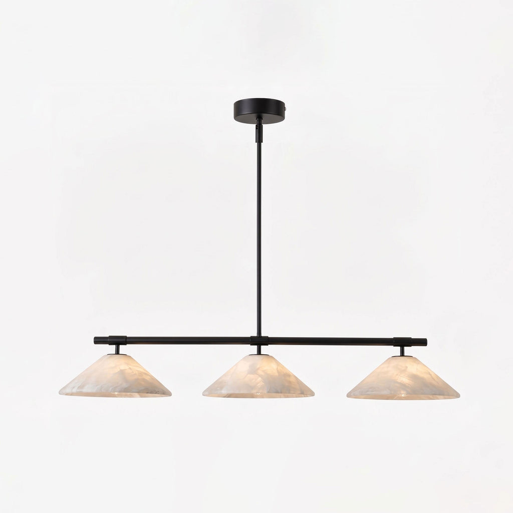 This matte black Clérachic chandelier hangs lit against a plain white studio background.
