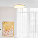 Frosted glass ceiling light shown close to the ceiling surface