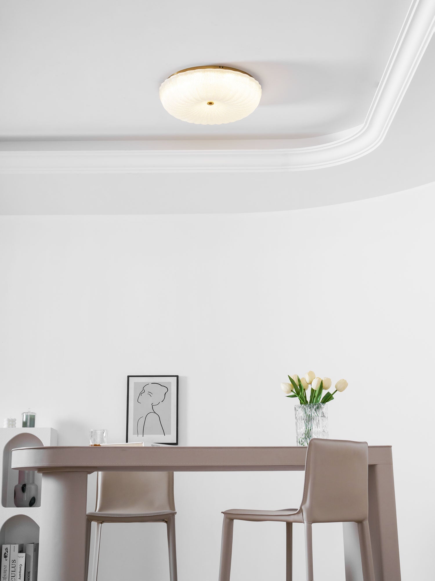 Frosted glass ceiling light casting warm even light