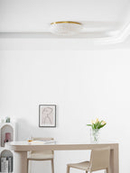 Frosted glass ceiling light detail with subtle glass shimmer