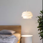 White rose floral pendant light over a dressing table