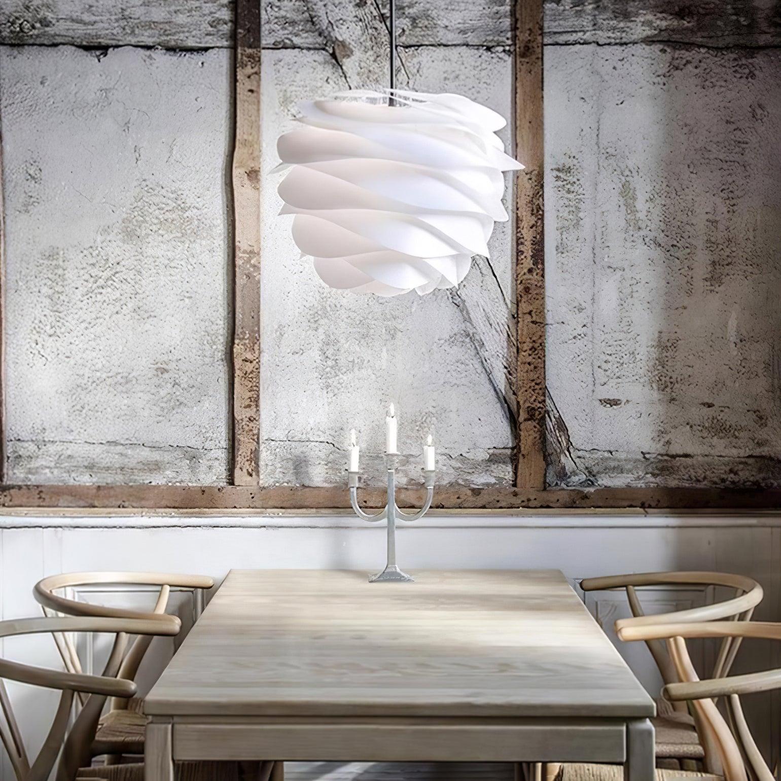 White rose floral pendant light hanging over a nook