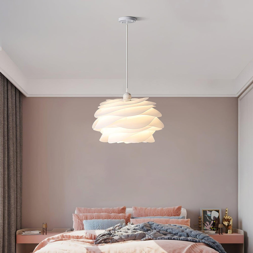 Floral pendant light with white roses over a side table