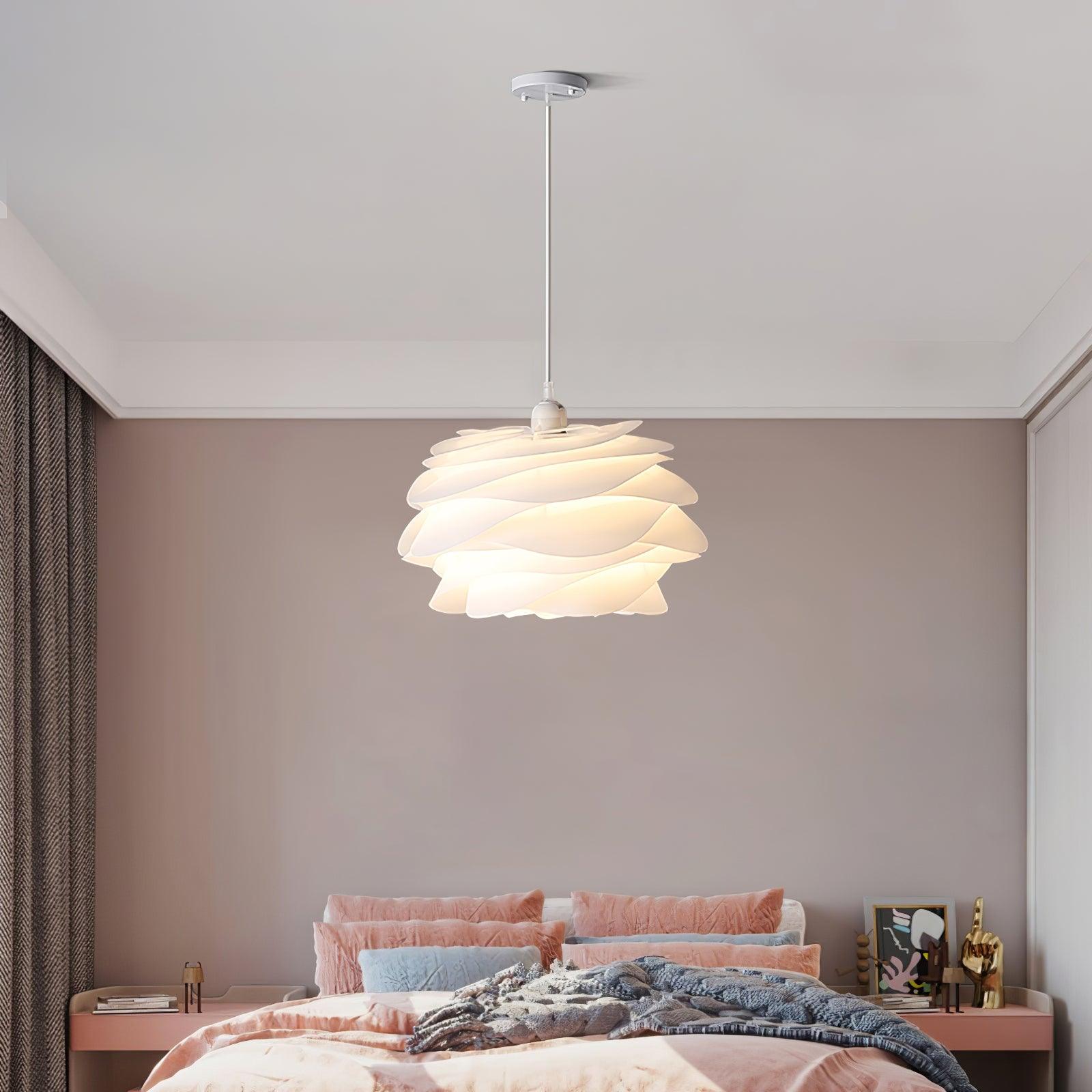 Floral pendant light with white roses over a side table