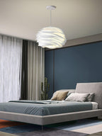 Floral pendant light close detail of white petal shade